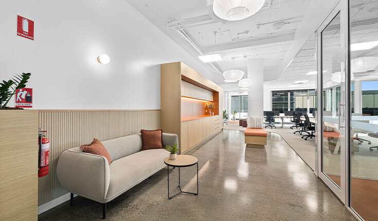 Office lounge area at 33 Argyle Street, Sydney with seating and walkway