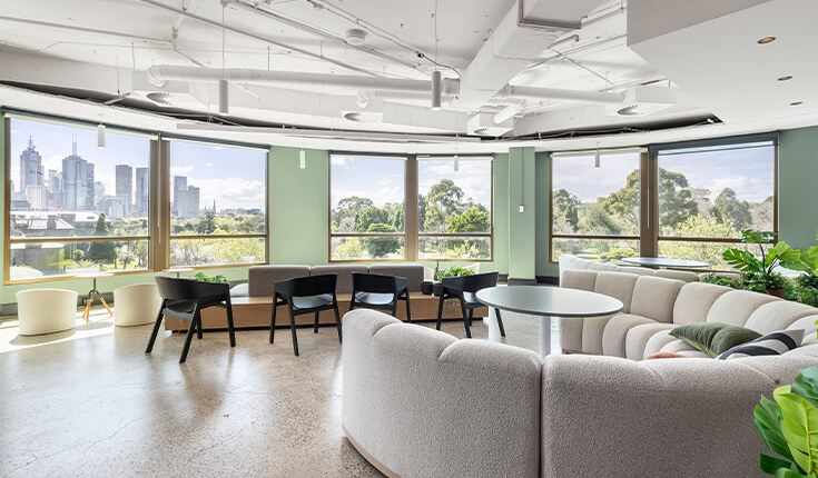 Office lounge area at 312 St Kilda Road with seating and city views