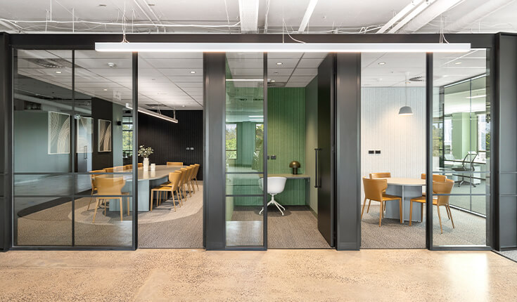 Modern meeting spaces at 312 St Kilda Road with enclosed glass rooms