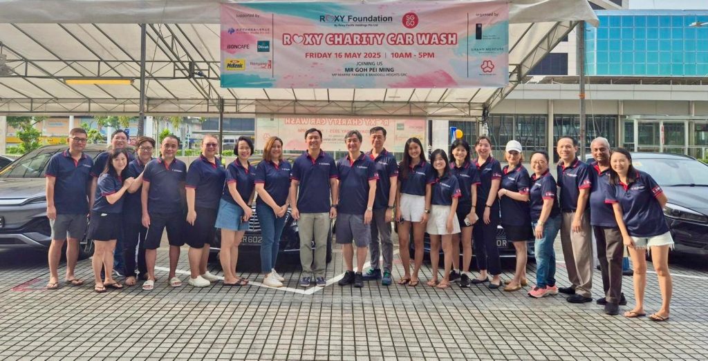 Roxy Foundation volunteers at charity car wash event in Singapore