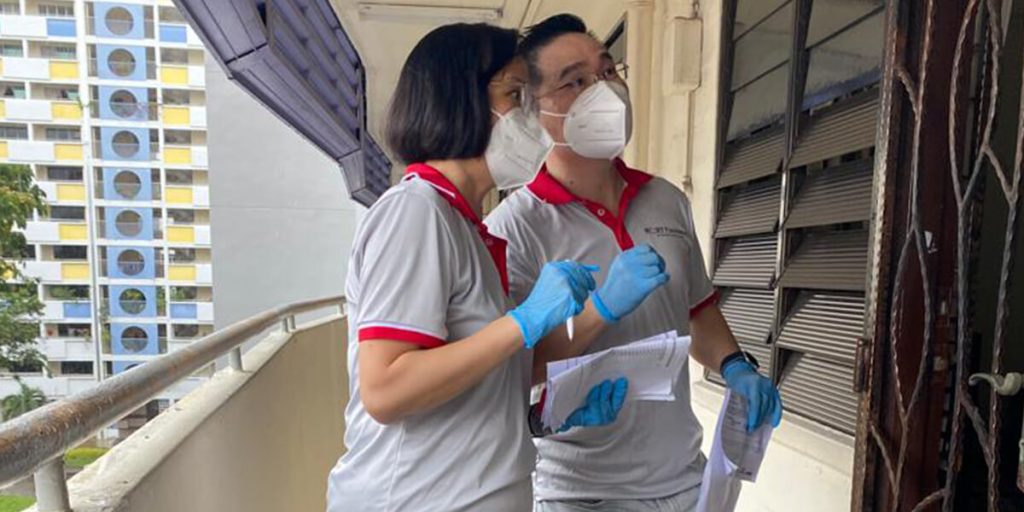 Volunteers coordinating distribution efforts during a community outreach