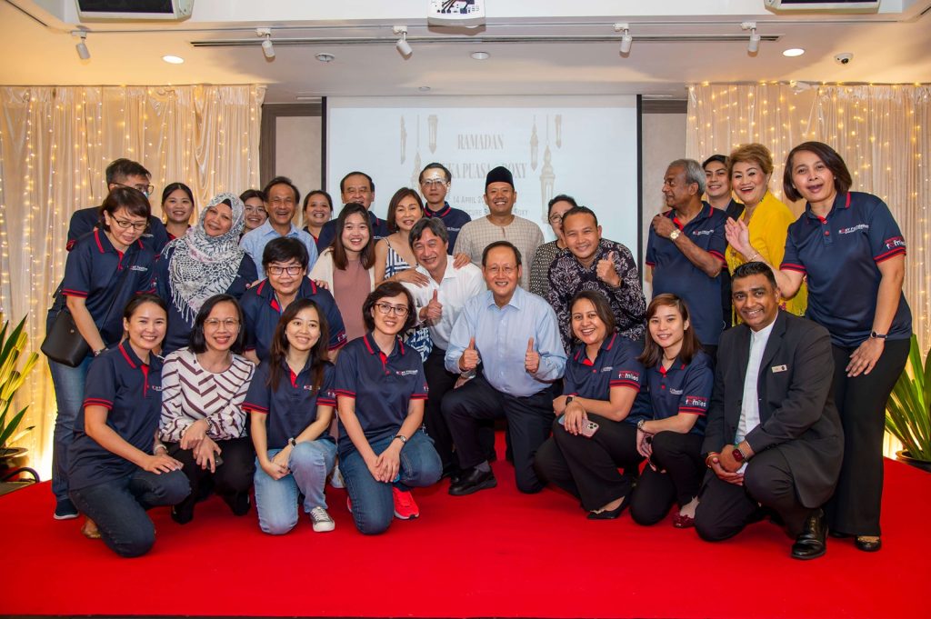 Roxy Foundation volunteers and partner during community celebration